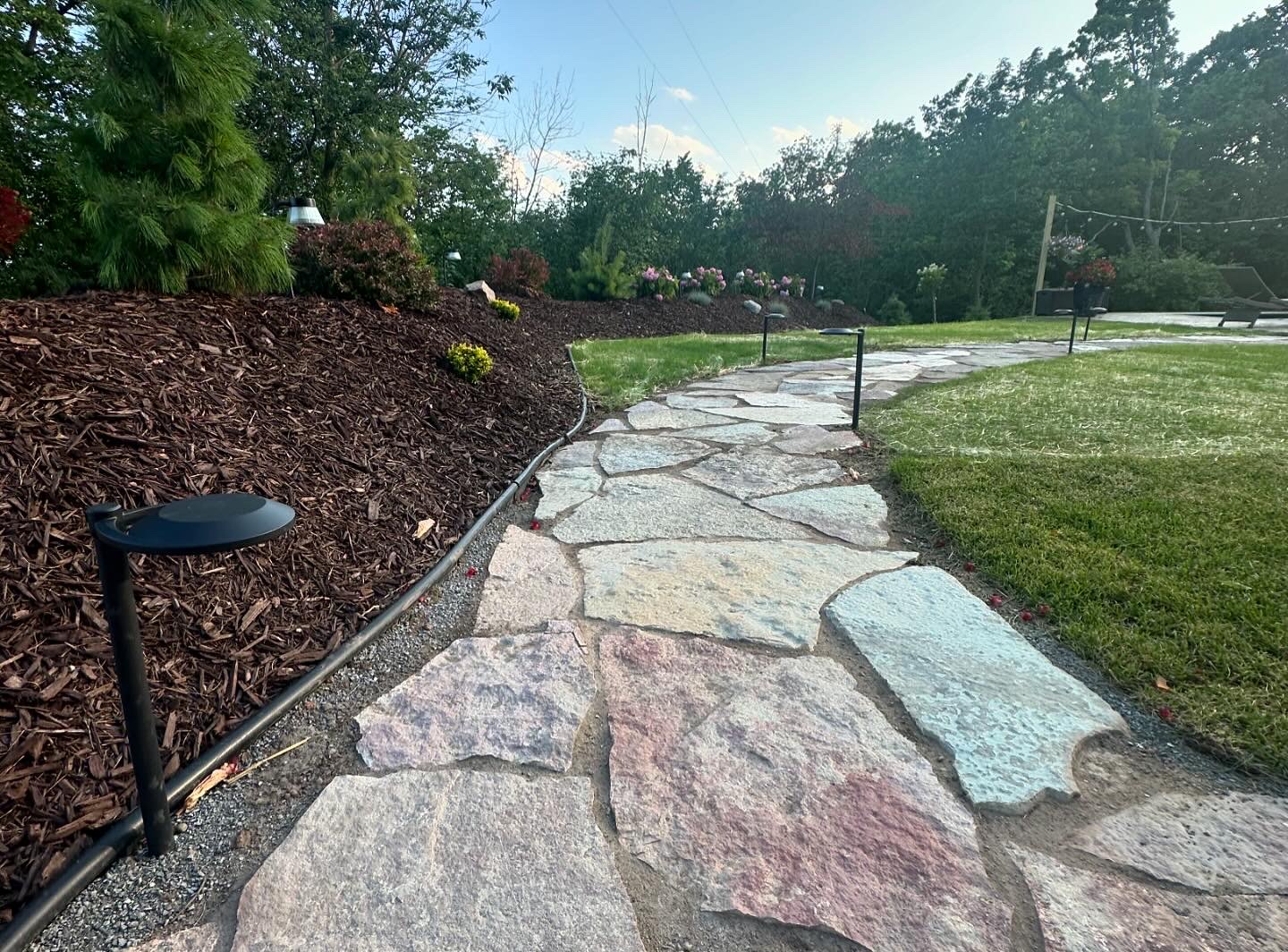 Patio and walkway installation by Precision Property Works